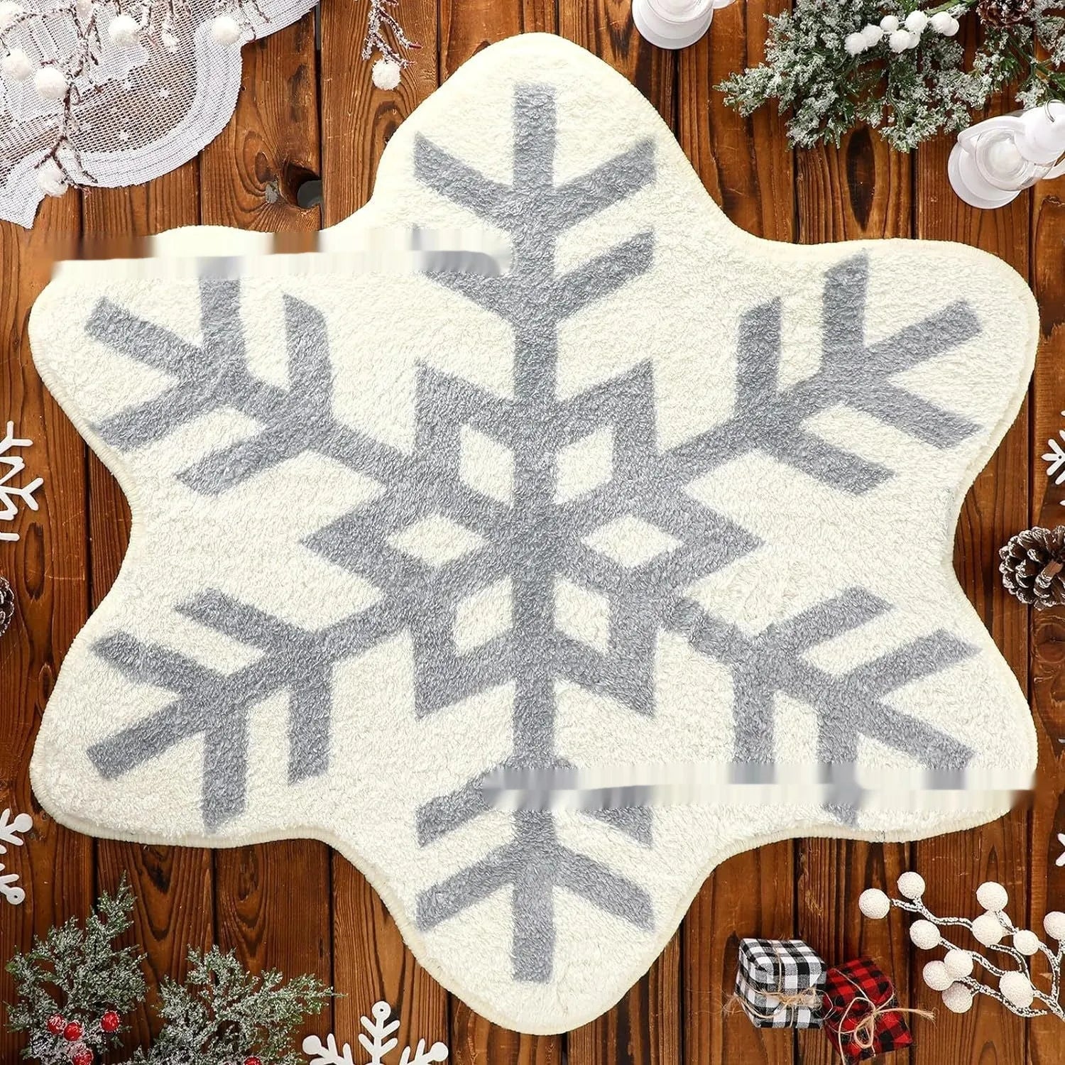 Round printed Christmas carpet on floor in festive red and green pattern.