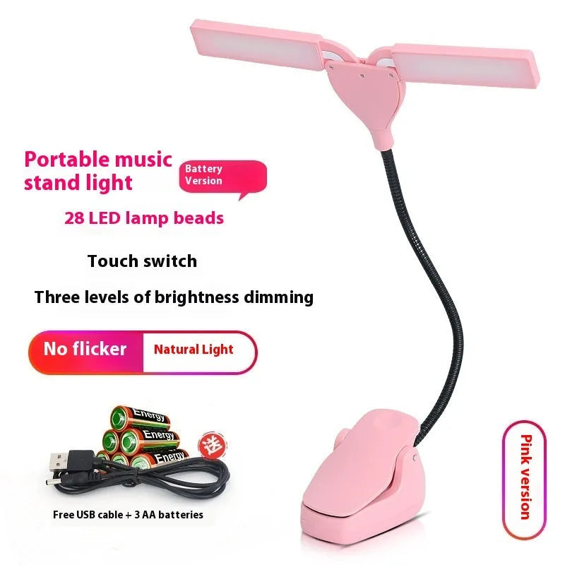 Black rechargeable music stand lamp with 28 LEDs attached to a metal music stand.