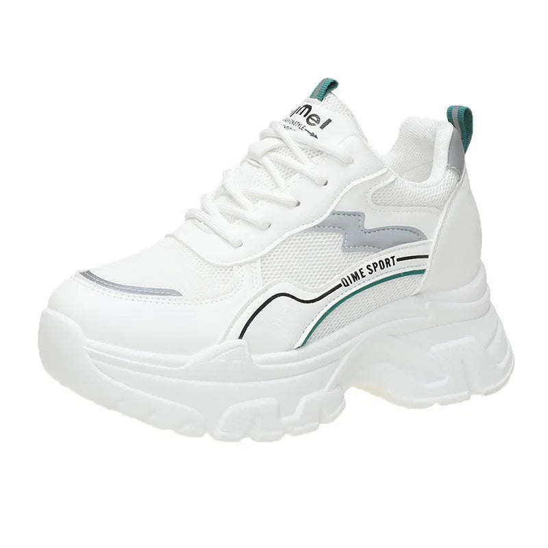White women's dad shoes with cross shoulder straps, breathable mesh, and a rubber sole.
