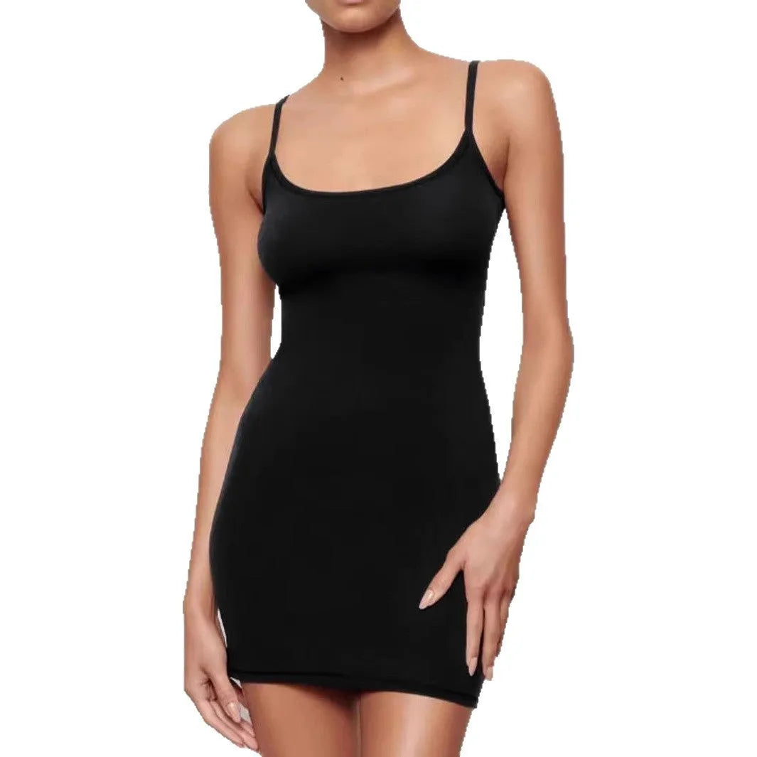 Black sleeveless sling dress with a short skirt and fitted sheath silhouette