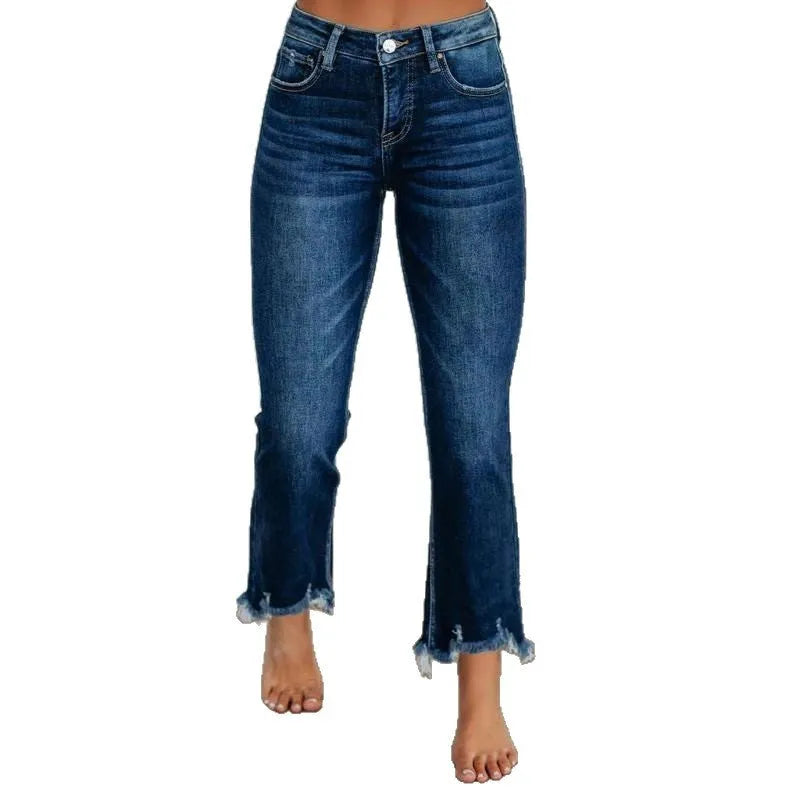 Women's solid colour denim jeans on a hanger showing hand-worn texture and available in dark blue and light blue