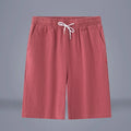 Cotton and linen cropped trousers in solid colours with a drawstring mid-waist