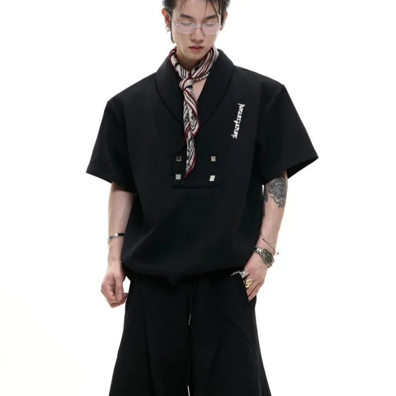 Men's dark grey cotton V-neck sports suit with padded shoulder short sleeve jacket and matching shorts.