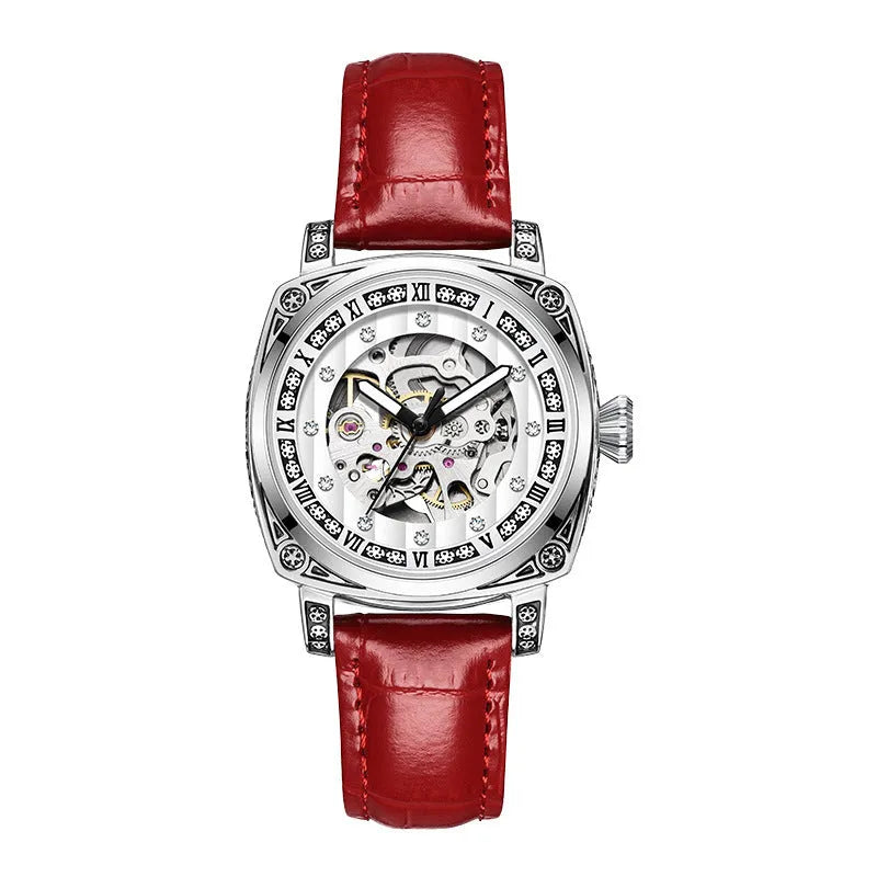 Leather strap mechanical watch with luminous hands on a wrist, showing black dial variant.