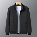 Men's black athletic jacket with a stand-up collar and front zip, showing a close-fitting cut
