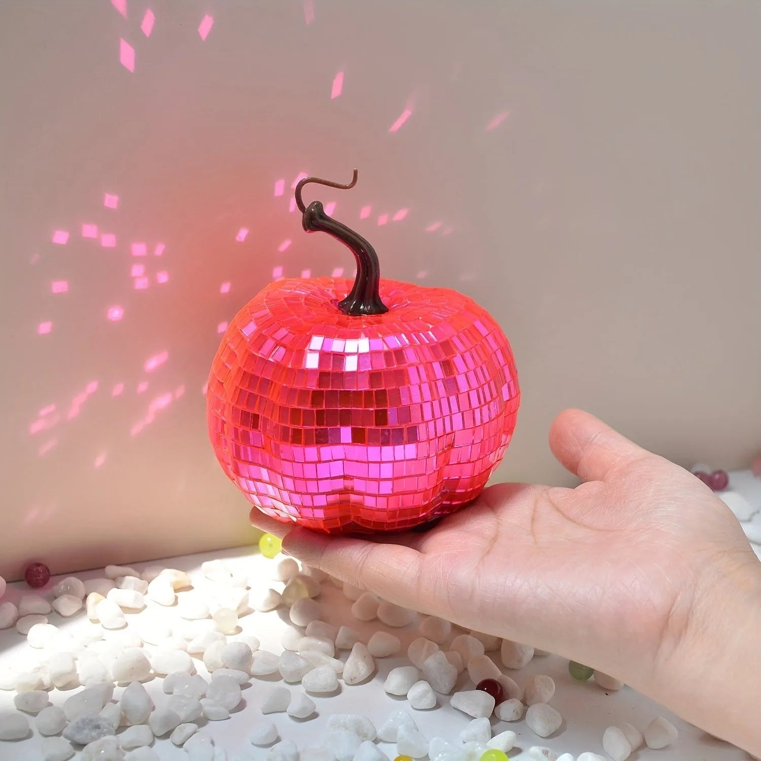 Glass pumpkin Halloween decoration in Chinese style, showing textured embroidered surface
