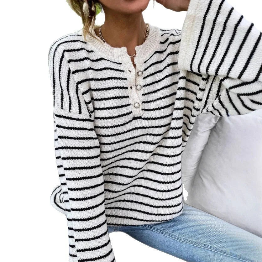 Black striped women's knitted top with drop shoulder sleeves and button detailing