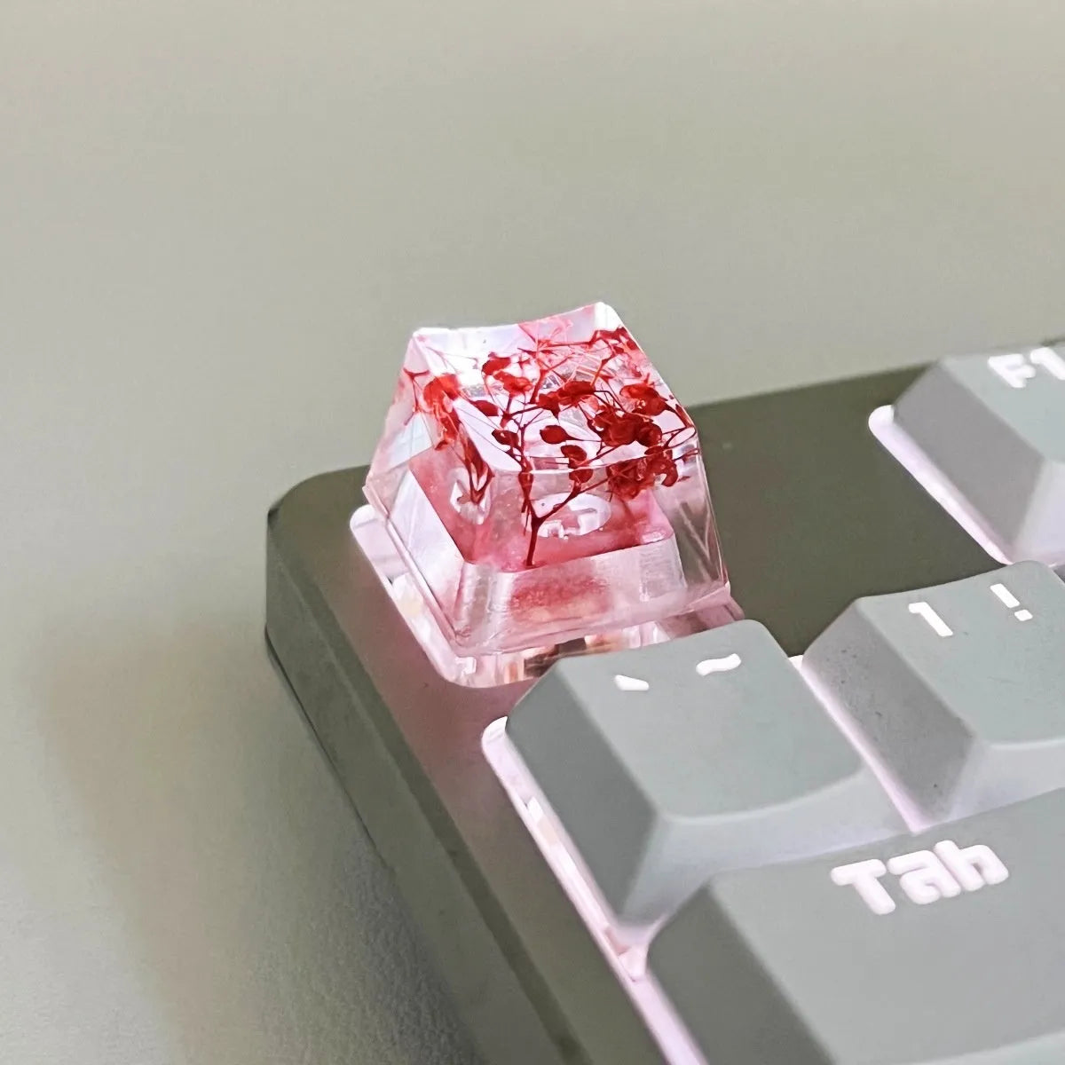 Resin starry sky artisan keycap in green, pink, red, or violet for mechanical keyboard customisation.