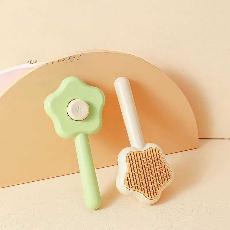 Green self-cleaning cat comb with stainless steel needle pins for pet grooming