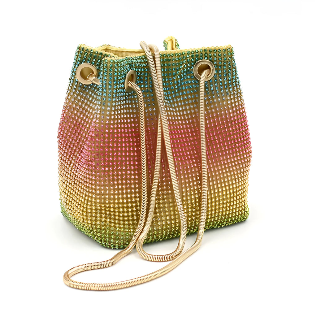Rhinestone-decorated rainbow bucket bag with shoulder strap on a soft fabric base