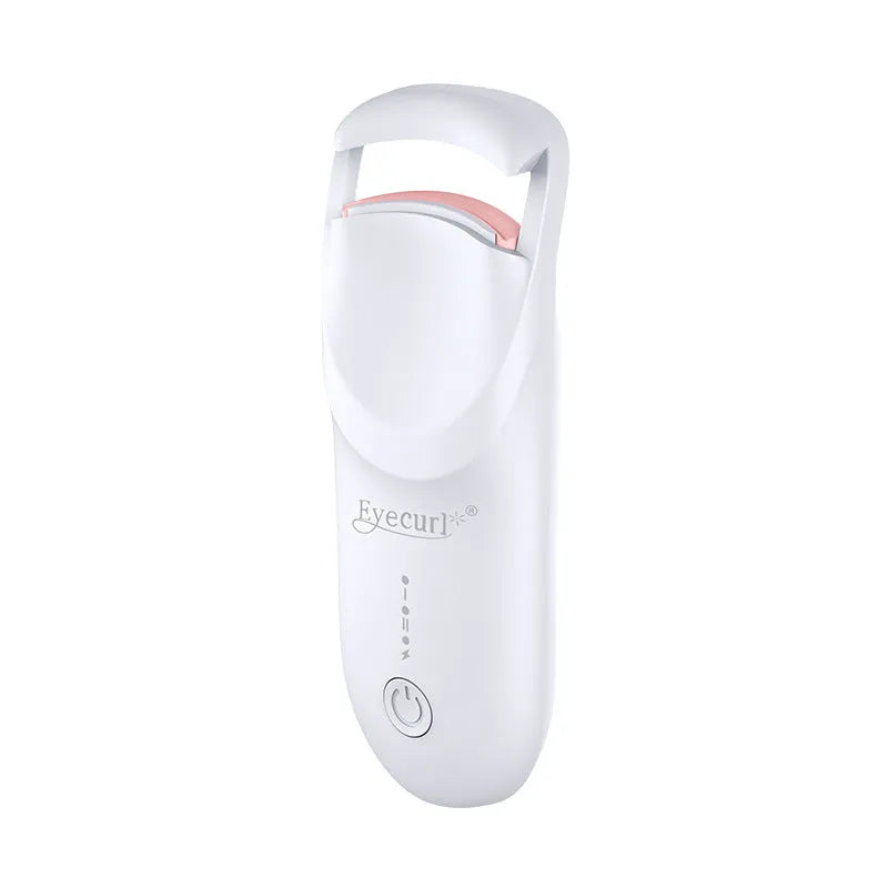 Electric heating eyelash curler in pink with USB charging cable on a white background