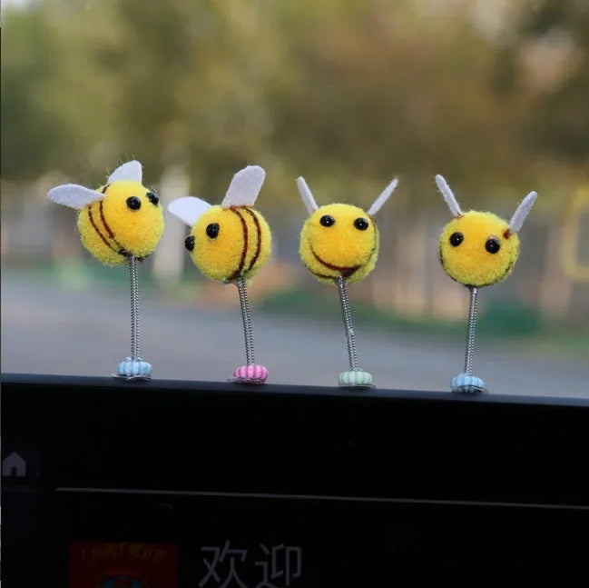 Yellow fur ball bee car decoration measuring 3cm square with cartoon design