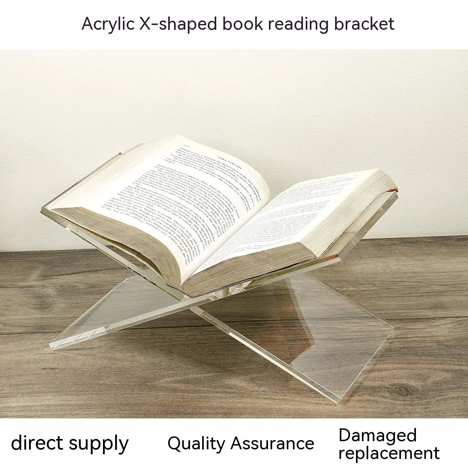 Clear acrylic X-shaped book display rack holding books upright on desktop