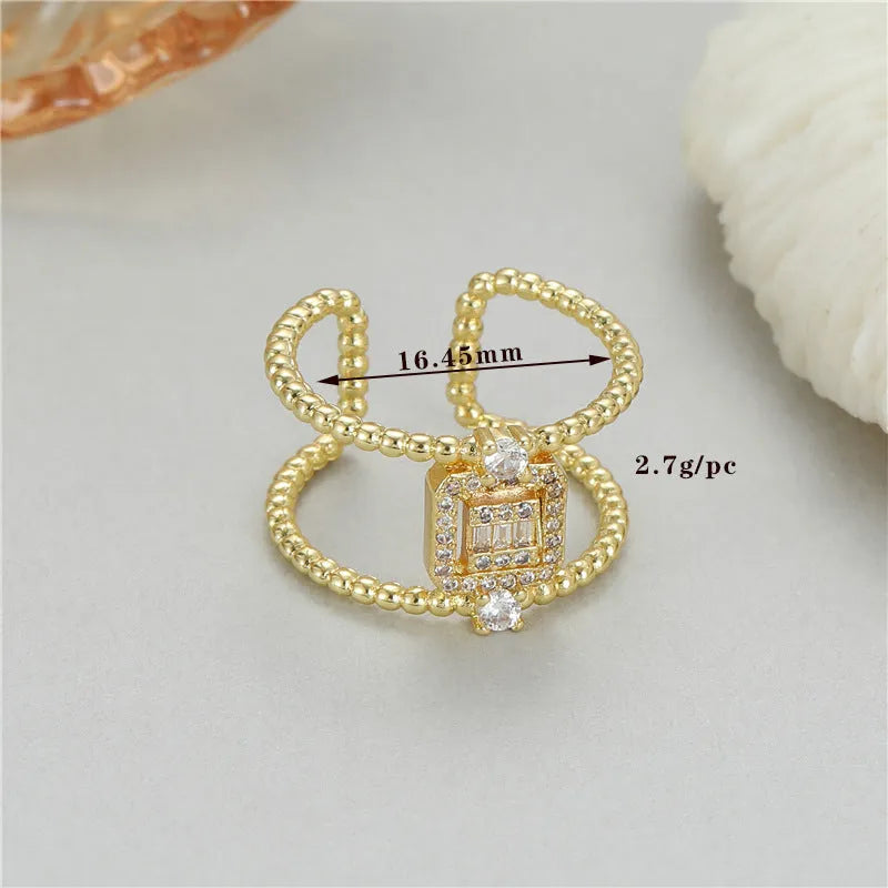 Adjustable open ring with 14K copper-plated gold finish and U-shaped asymmetric design