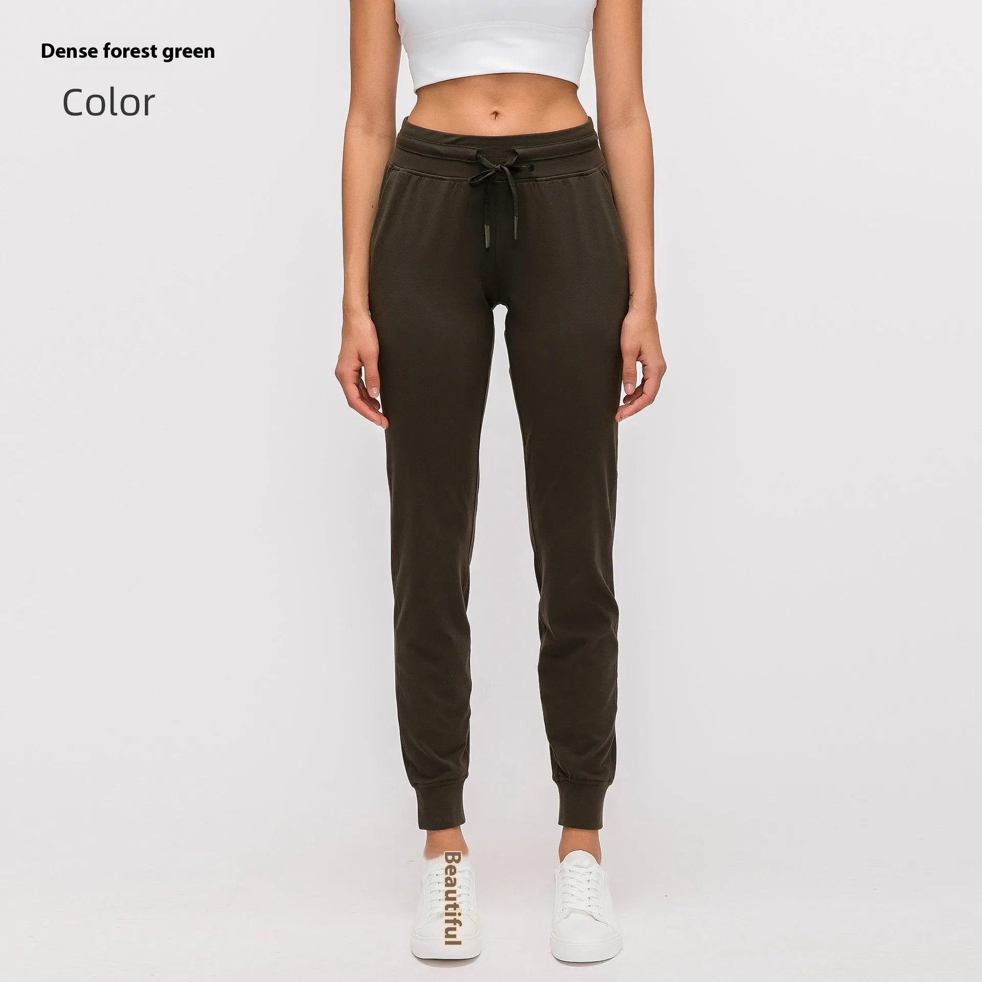 Women's high-waist yoga pants with drawstring waistband in a cotton blend fabric.