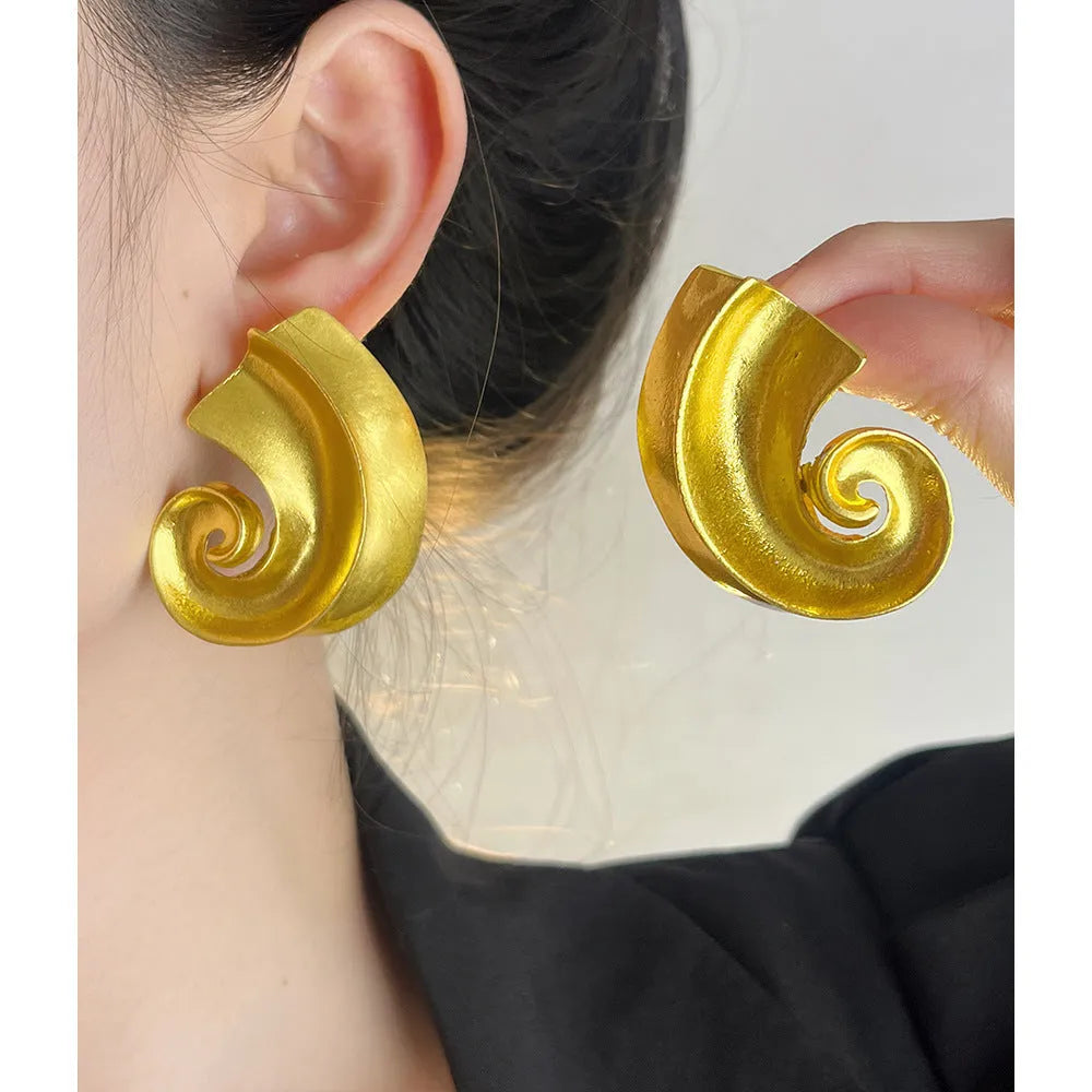 Geometric retro ear studs in gold and silver electroplated alloy, approximately 5cm size with stud fastening