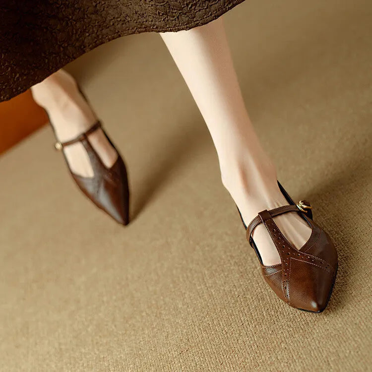 Women's brown pointed toe low-cut flat shoes in cowhide leather with metal details
