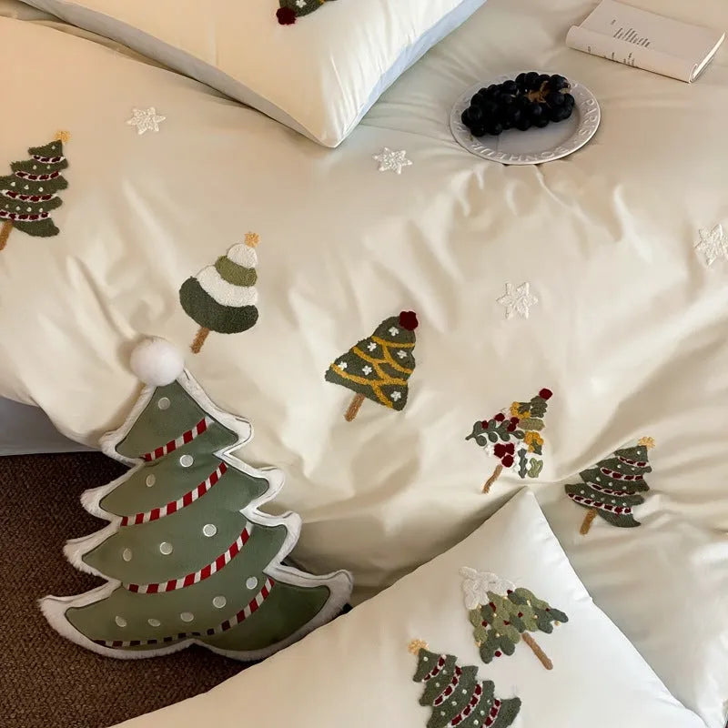Cotton four-piece bedding set with embroidered Christmas tree towel design on duvet cover