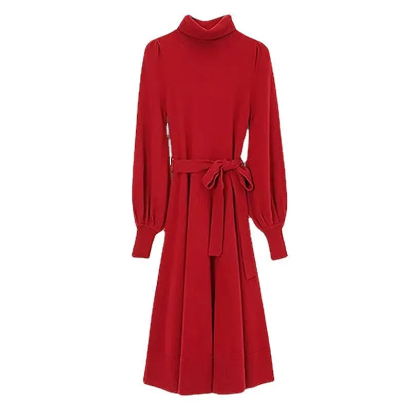 A rose red loose-fit turtleneck knit dress for women with long sleeves and a mid-length flared skirt.