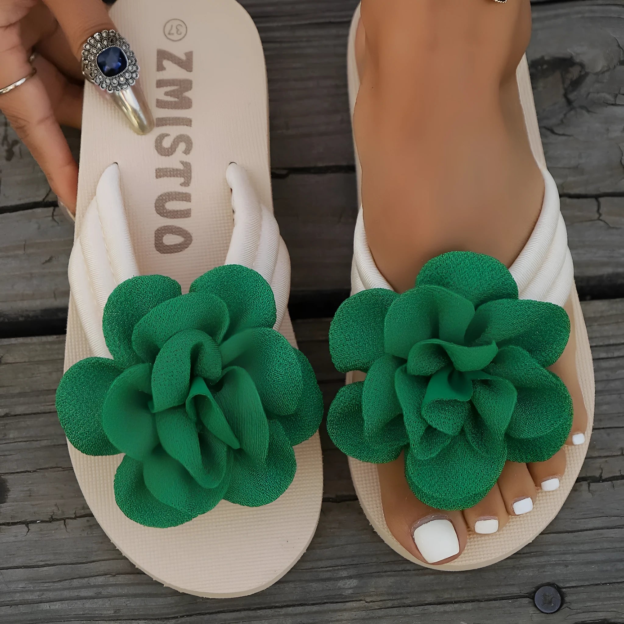 Plus size green PU slipper with round toe holder and flower strap, shown next to rose red and beige colour options.