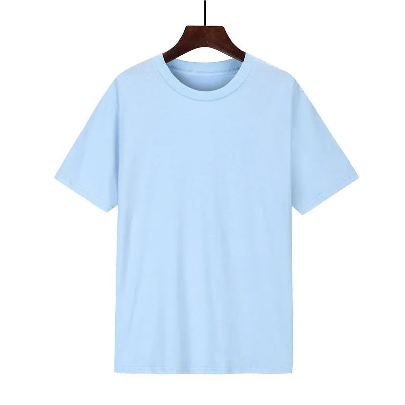 Men's loose-fit cotton t-shirt in black, shown on a model, with short sleeves.