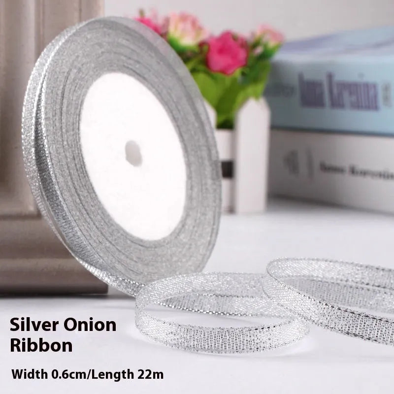 Roll of narrow 0.6cm wide polyester satin ribbon in a choice of colours, showing 22 metre length.