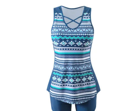 Women's floral printed two-piece swimsuit with sleeveless top and matching shorts in blue or green