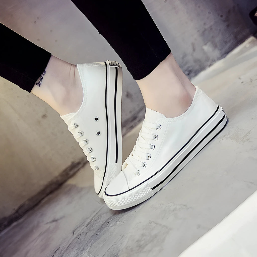 Women's solid colour canvas casual shoes for summer in black, white black, white red, and all black.
