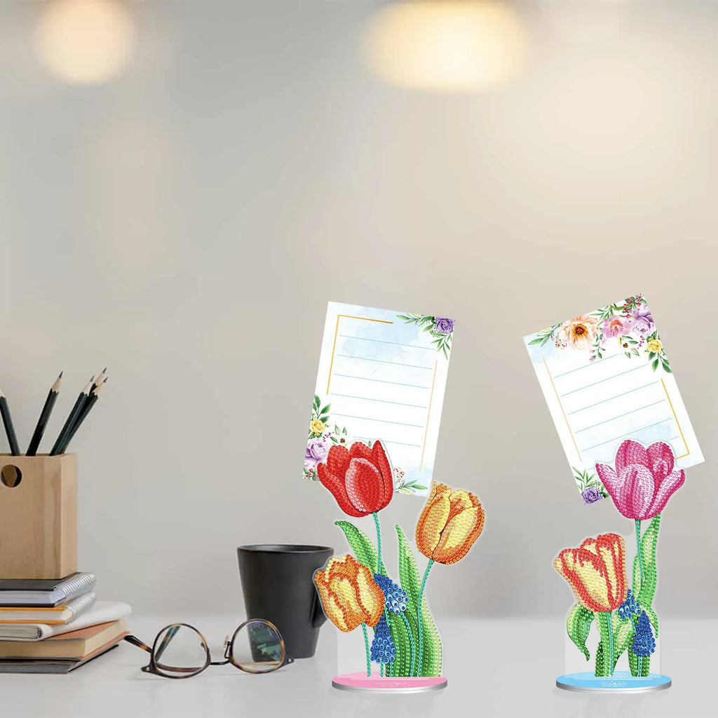 Handmade frameless desktop note clip holding a diamond painting, measuring 19cm wide.