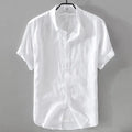 Man wearing a light-coloured pure linen short sleeve casual shirt with a loose fit