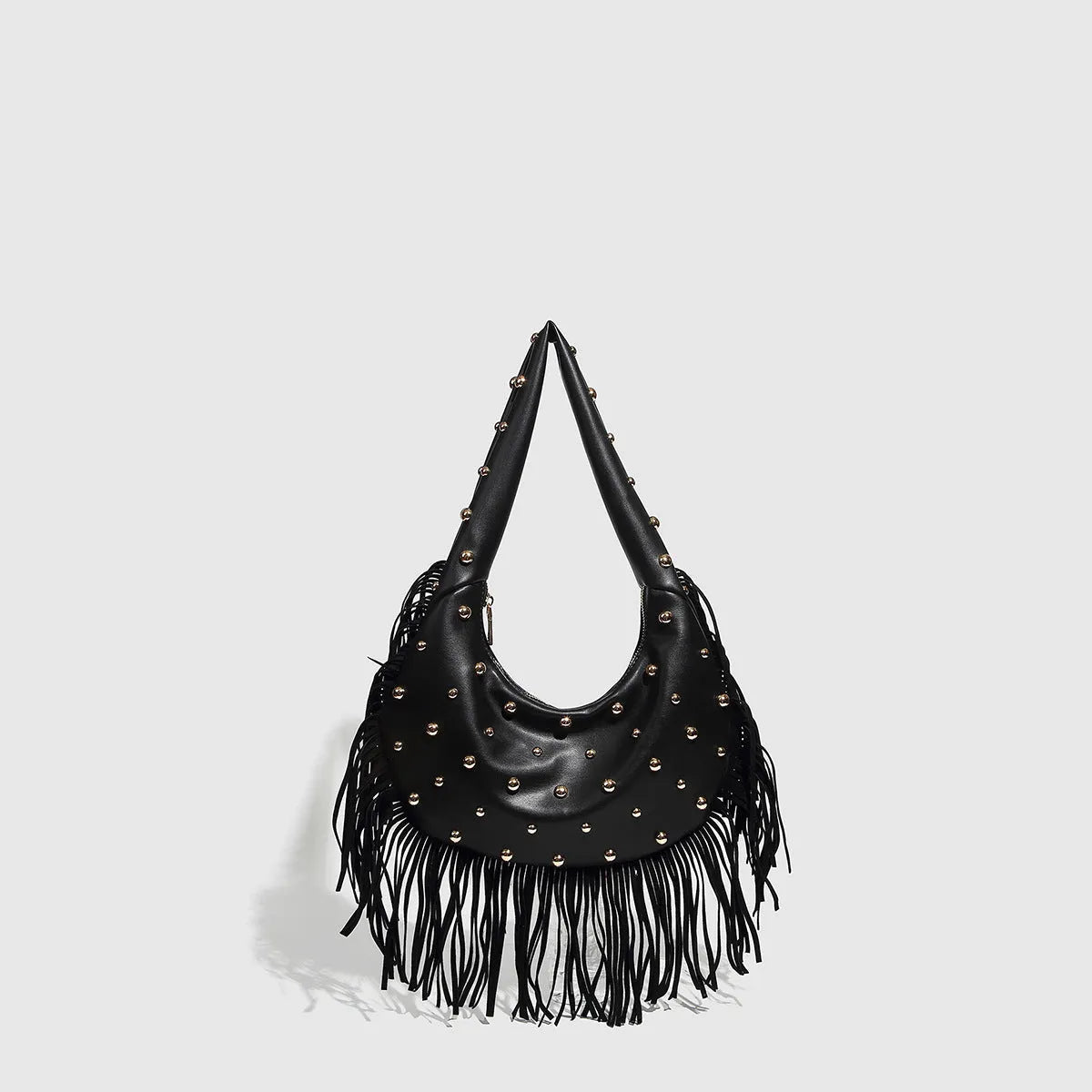 Retro black shoulder handbag with decorative tassel and internal mobile phone pocket