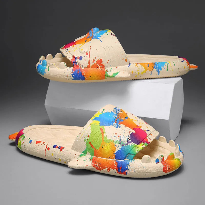 Open-toe EVA foam home slippers with shark design in beige, black, grey, and white colours.