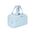Large fluffy travel toiletry bag with wide open top, shown in a choice of colours.
