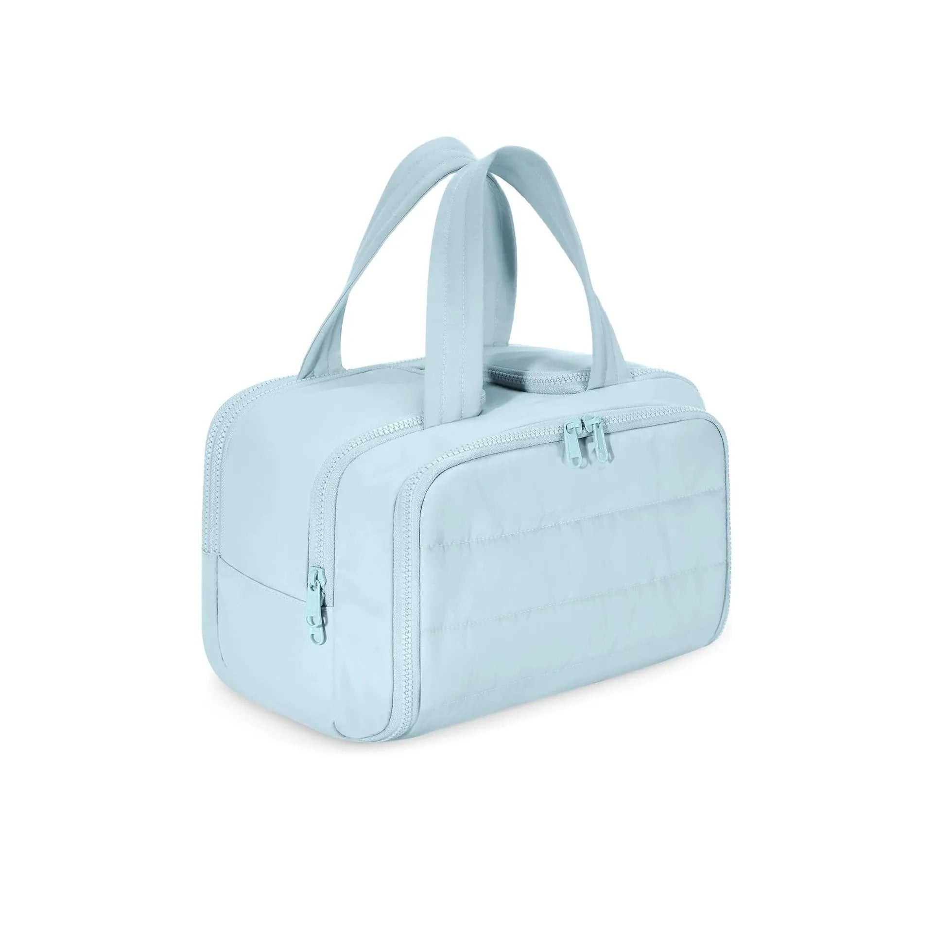 Large fluffy travel toiletry bag with wide open top, shown in a choice of colours.