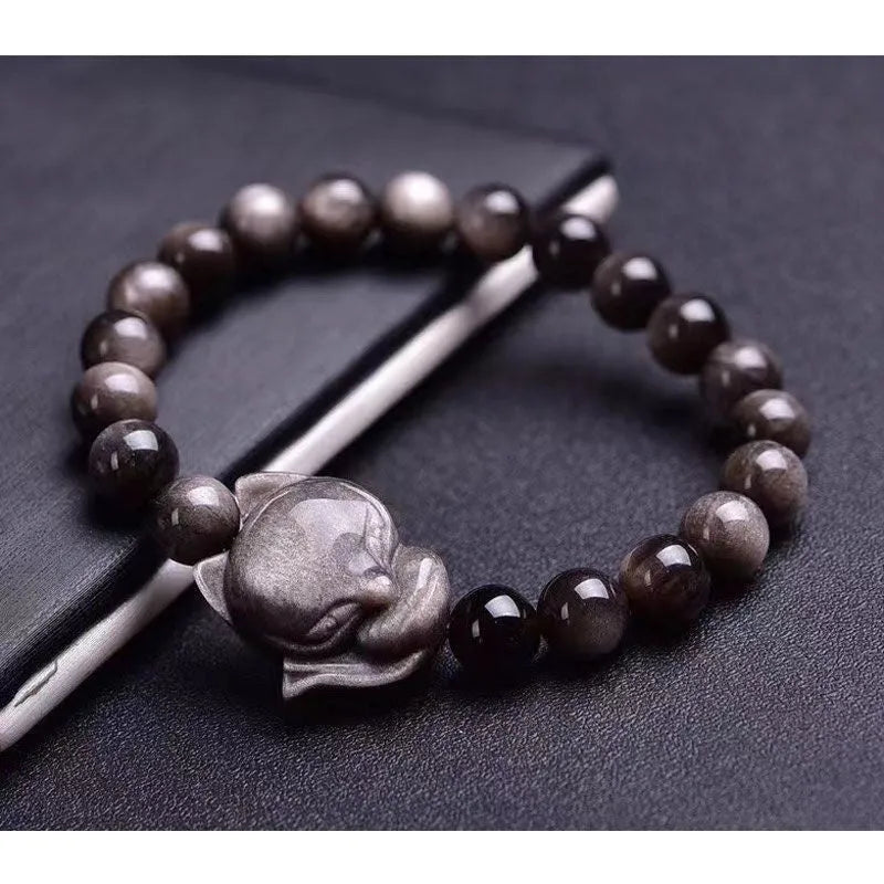 Obsidian fox bracelet with 8mm black beads and silver fox charm on adjustable black cord