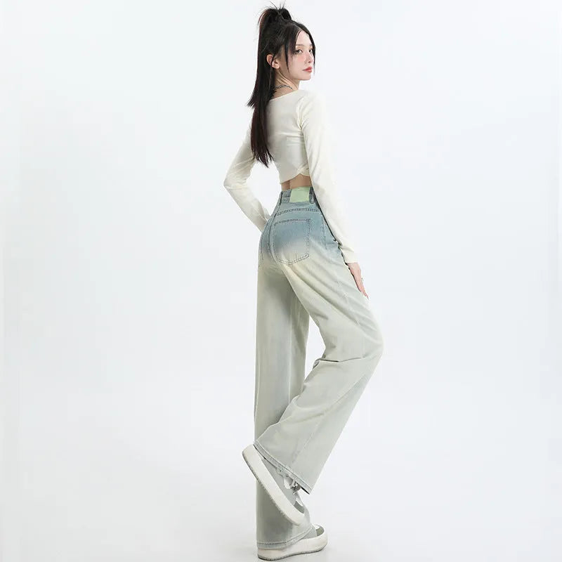 Women's straight-leg cotton denim trousers in a gradient blue colour with a wide leg fit.