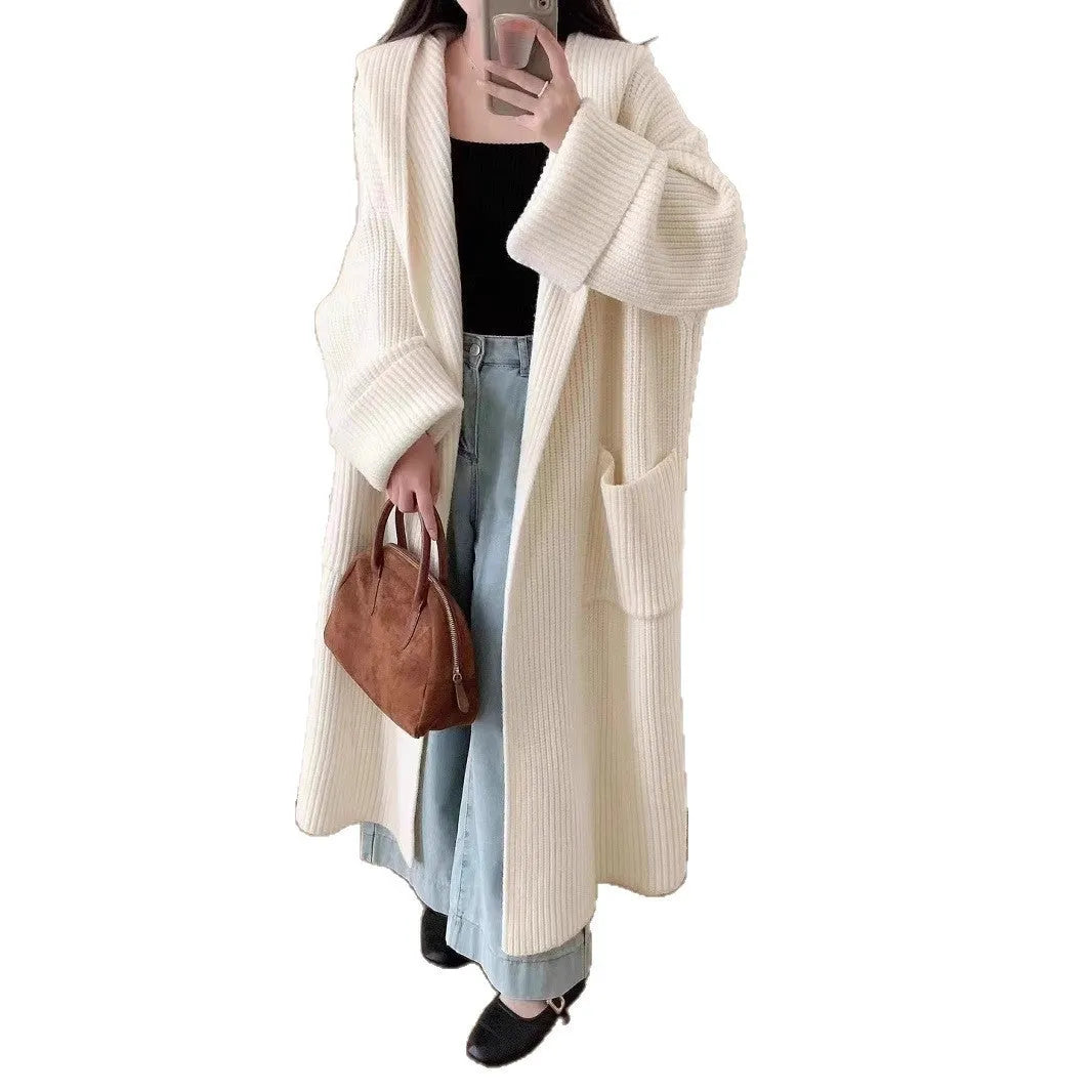 Loose hooded acrylic cardigan sweatshirt in milky white colour showing raglan sleeves and 80cm length