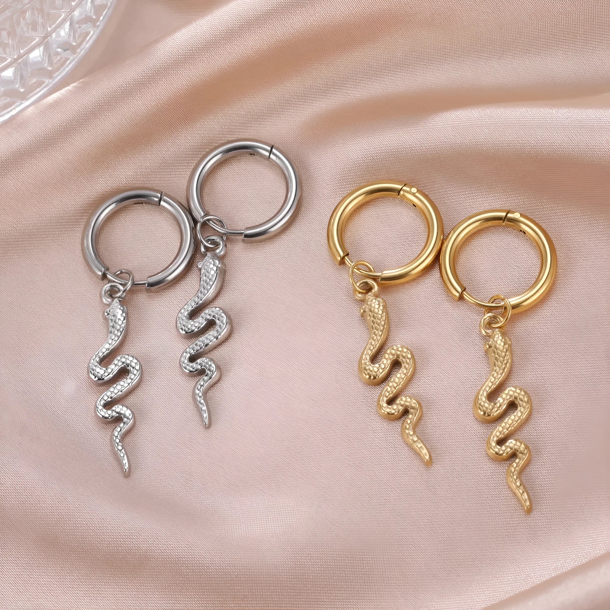 Gold plated stainless steel snake-shaped vintage clip-on earrings for women.