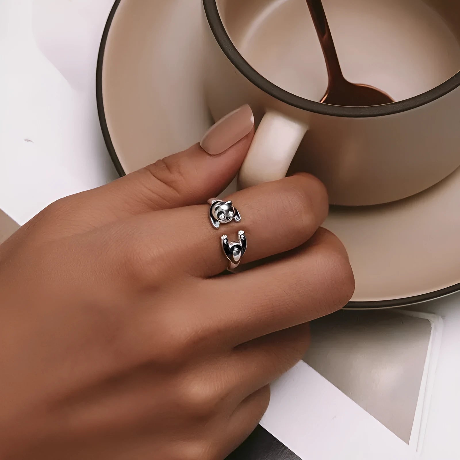 Adjustable sterling silver panda ring bracelet with white gold plating and open design