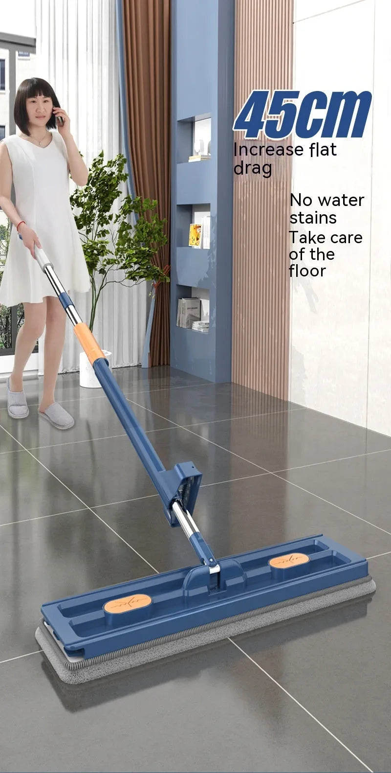 Large flat mop with long stainless steel handle and blue fine fibre cloth attached to a 360-degree rotating head.