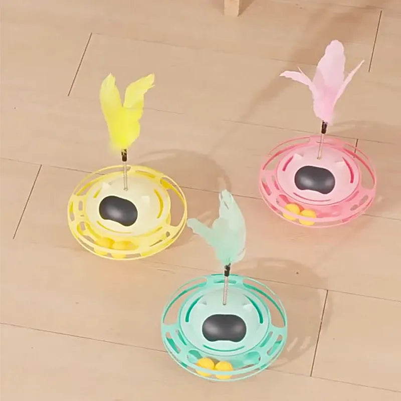Pink cat tumbler turntable toy measuring 17cm tall with four play options