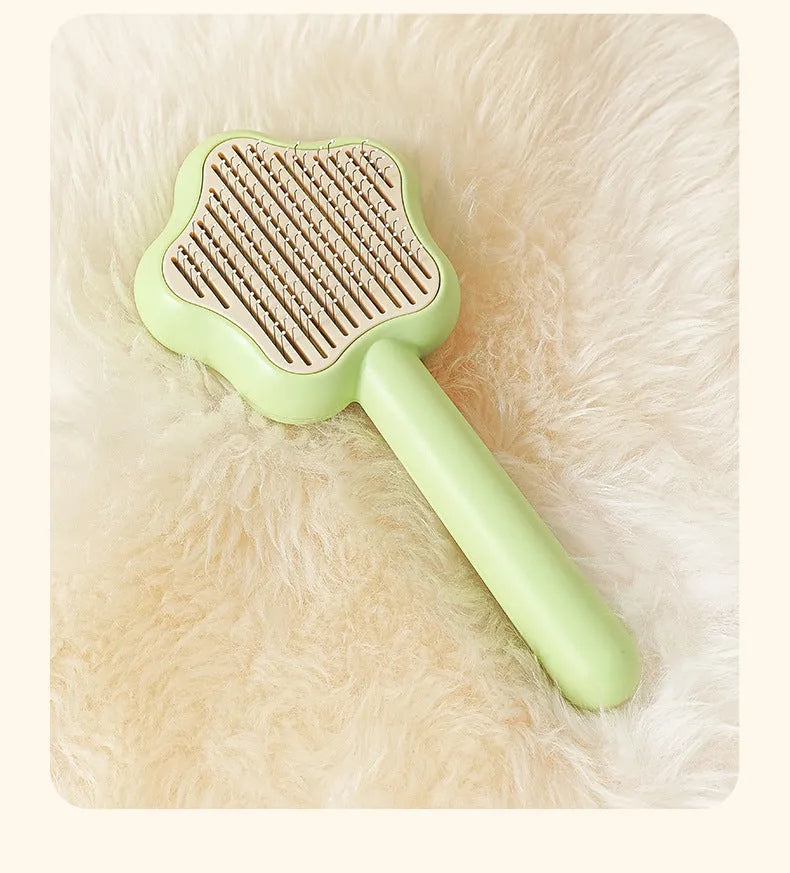Green self-cleaning cat comb with stainless steel needle pins for pet grooming