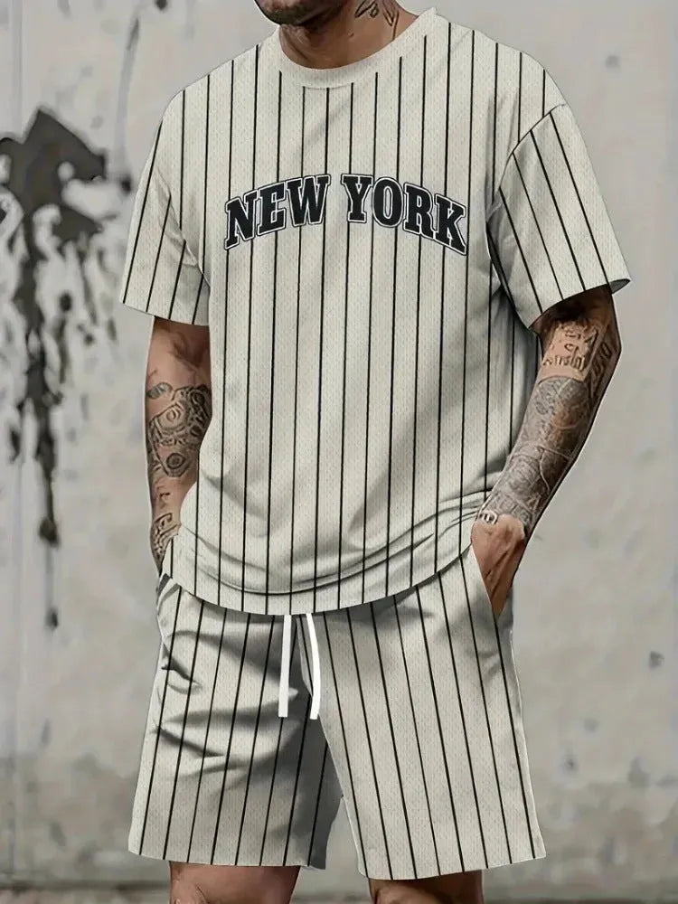Men's grey 3D printed short sleeve top and shorts sport suit on a hanger.