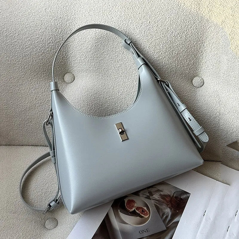 Genuine leather dumpling-shaped crossbody bag with multiple compartments in apricot colour
