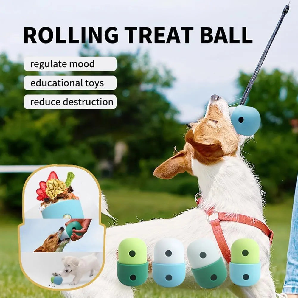 White and blue food grade silicone dog puzzle ball treat toy shown on a wooden floor.