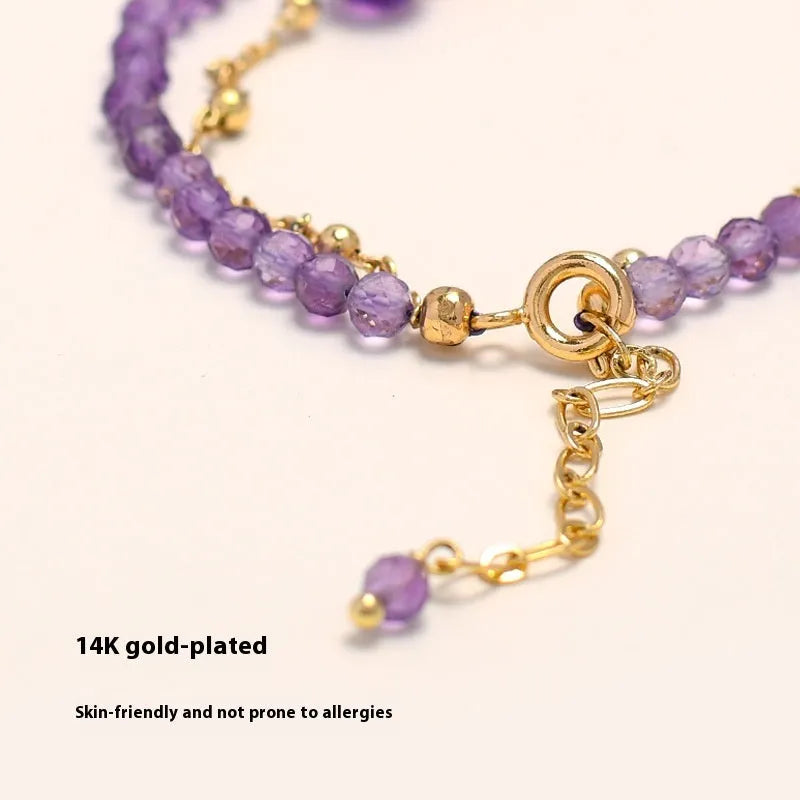 Women's amethyst Chinese style crystal bracelet with diamond-shaped beads and electroplated metal.