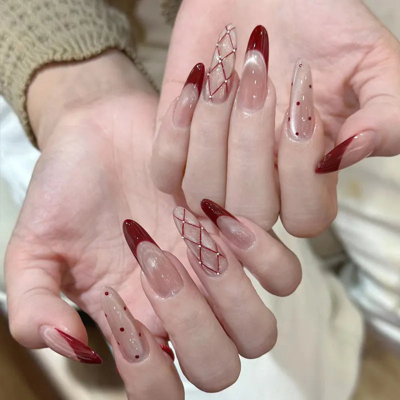 Set of colourful press-on false nails for girls with adhesive tabs on a white background.