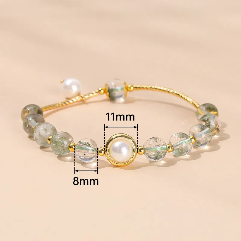 Handmade girls bracelet with natural agate, crystal beads in four colours, and cute fruit and animal shapes.
