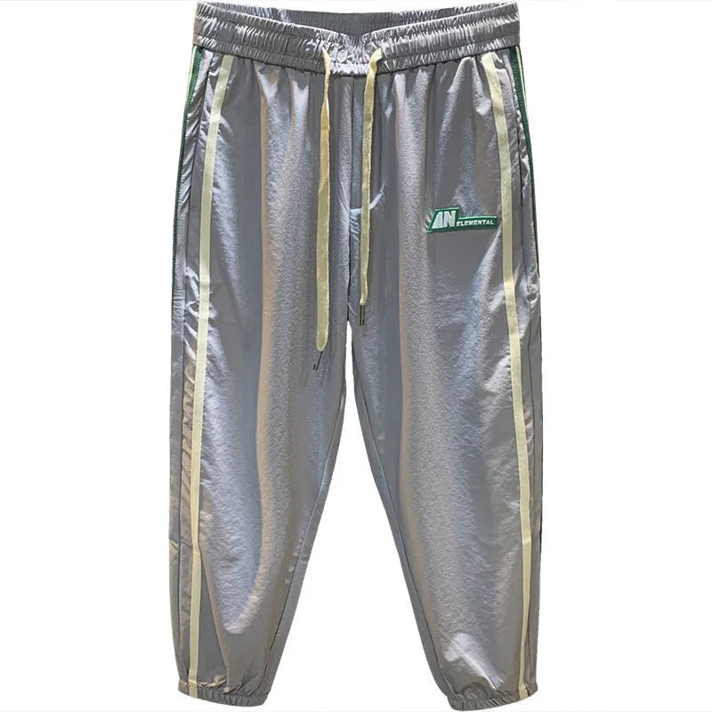Men's black cotton harem pants with a loose fit and mid waist