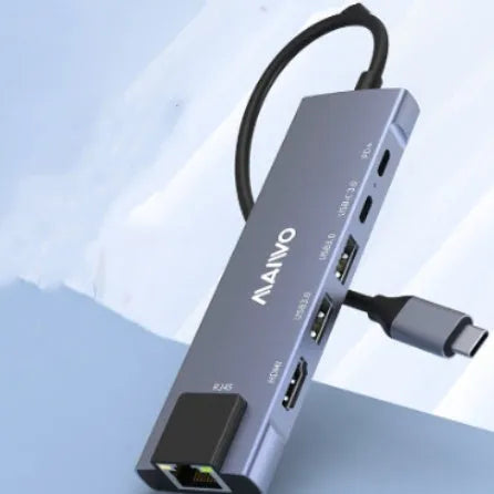 Steam Deck 6-in-1 aluminium docking station showing USB-C, HDMI, Ethernet, and USB ports